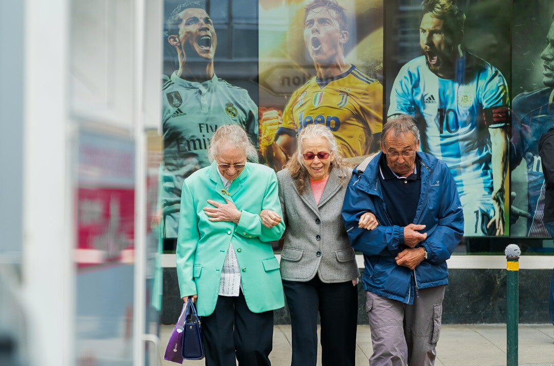 elderly group walking